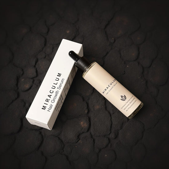 Dasifey MIRACULUM Hair Growth Serum – Flasche mit Pipette neben Produktverpackung auf dunklem Untergrund.